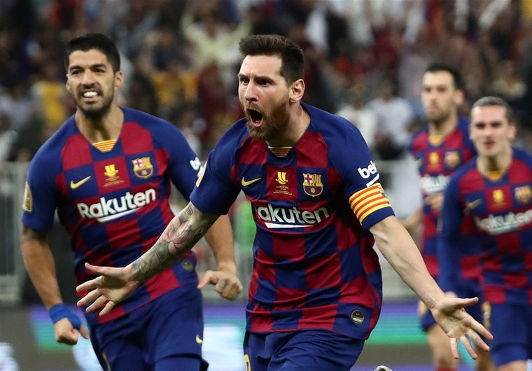 Lionel Messi schreeuwt het uit na zijn gelijkmaker. Even later werd zijn tweede goal van de avond afgekeurd wegens hands.