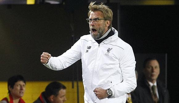 Jürgen Klopp viert de 0-1 van Liverpool even uitbundig als altijd. Zelfs tegen zijn oude vrienden van Dortmund dus.
