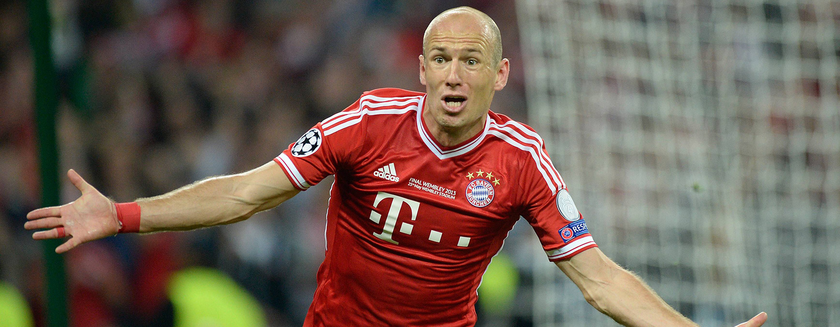 Robben is blij: hij heeft zojuist de 2-1 gemaakt in de Champions League tegen Borussia Dortmund. Het zou de winnende blijken.