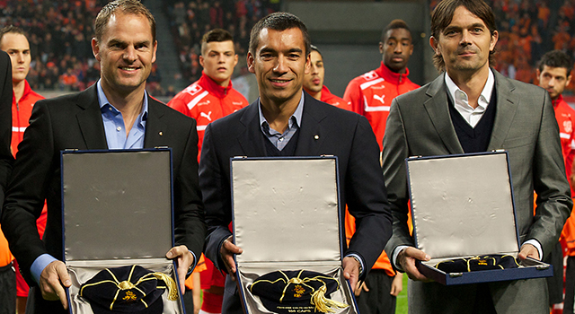 Frank de Boer, Giovanni van Bronckhorst en Phillip Cocu worden in november 2011 gehuldigd voor het bereiken van honderd interlands als speler en hebben uit handen van KNVB-voorzitter Michael van Praag de daarbij behorende cap ontvangen. 