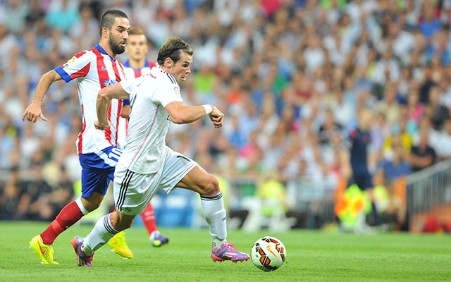 Derde keer: Real – Atlético (13 september 2014, Primera División). Nu verliest Real ook in eigen stadion van de erfvijand. Doelpunten van Arda Turan (op de foto met Gareth Bale) en Tiago dompelen De Koninklijke in rouw: 1-2.
