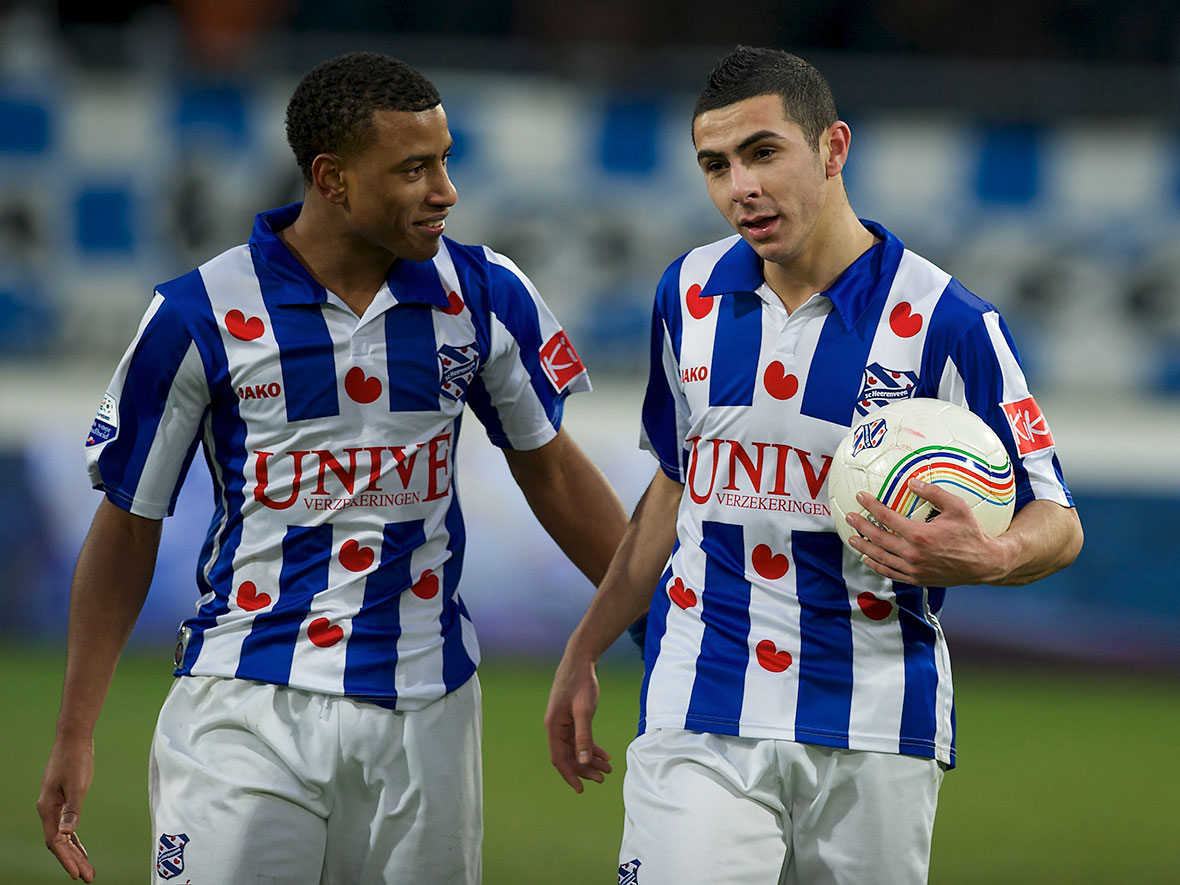 Oussama Assaidi (rechts) speelde in 2010 de wedstrijd van zijn leven tegen FC Twente.