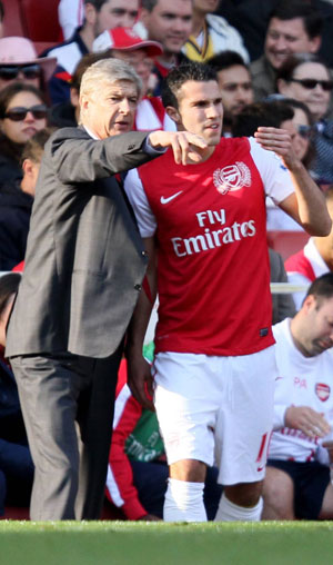 Robin van Persie en manager Arsène Wenger ten tijde van hun samenwerking in Londen. 