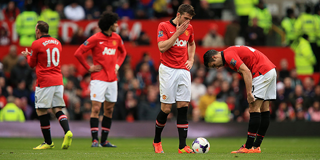 Spelers van Manchester United tijdens de pijnlijke thuisnederlaag tegen rivaal Liverpool (0-3) van 16 maart.